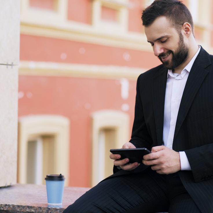 Mobile app project planning workspace with devices and development tools